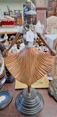 Lot 383 - A bronzed Art Deco style figure of a dancer,...