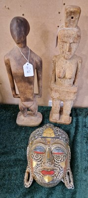 Lot 384 - Tribal art: a carved wooden ancestor figure in...