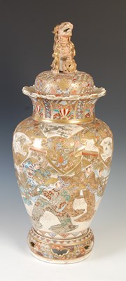 Lot 602 - A Japanese Satsuma pottery jar, cover and...