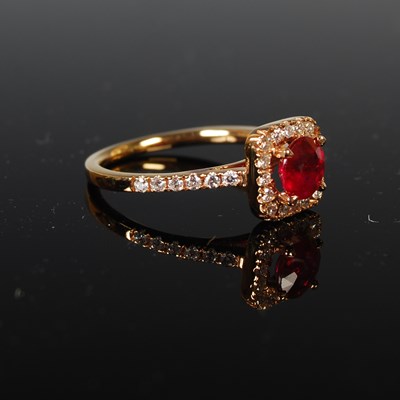 Lot 63 - A yellow metal, ruby and diamond set cocktail...