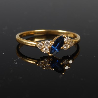 Lot 64 - An 18ct gold sapphire and diamond cocktail...