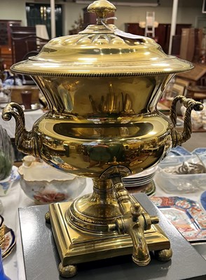 Lot 394 - An antique brass samovar.