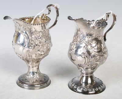 Lot 115 - Two George III silver cream jugs, one...
