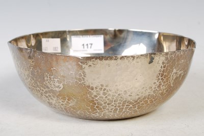 Lot 117 - A Japanese white metal bowl with hammered...
