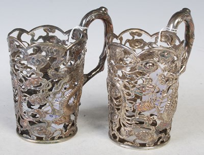 Lot 125 - A pair of Chinese silver cupholders, makers...