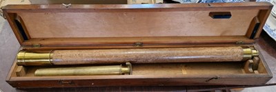 Lot 401 - An antique brass and leather bound single draw...