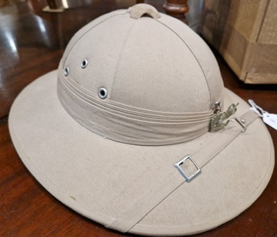 Lot 542 - A vintage pith type helmet, the interior with...