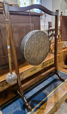 Lot 404 - An antique bronze dinner gong and beater.