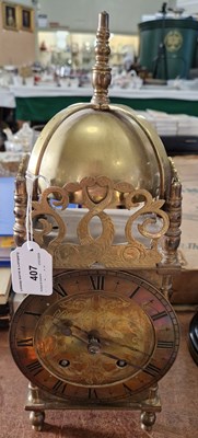 Lot 407 - An early 20th century brass lantern clock with...