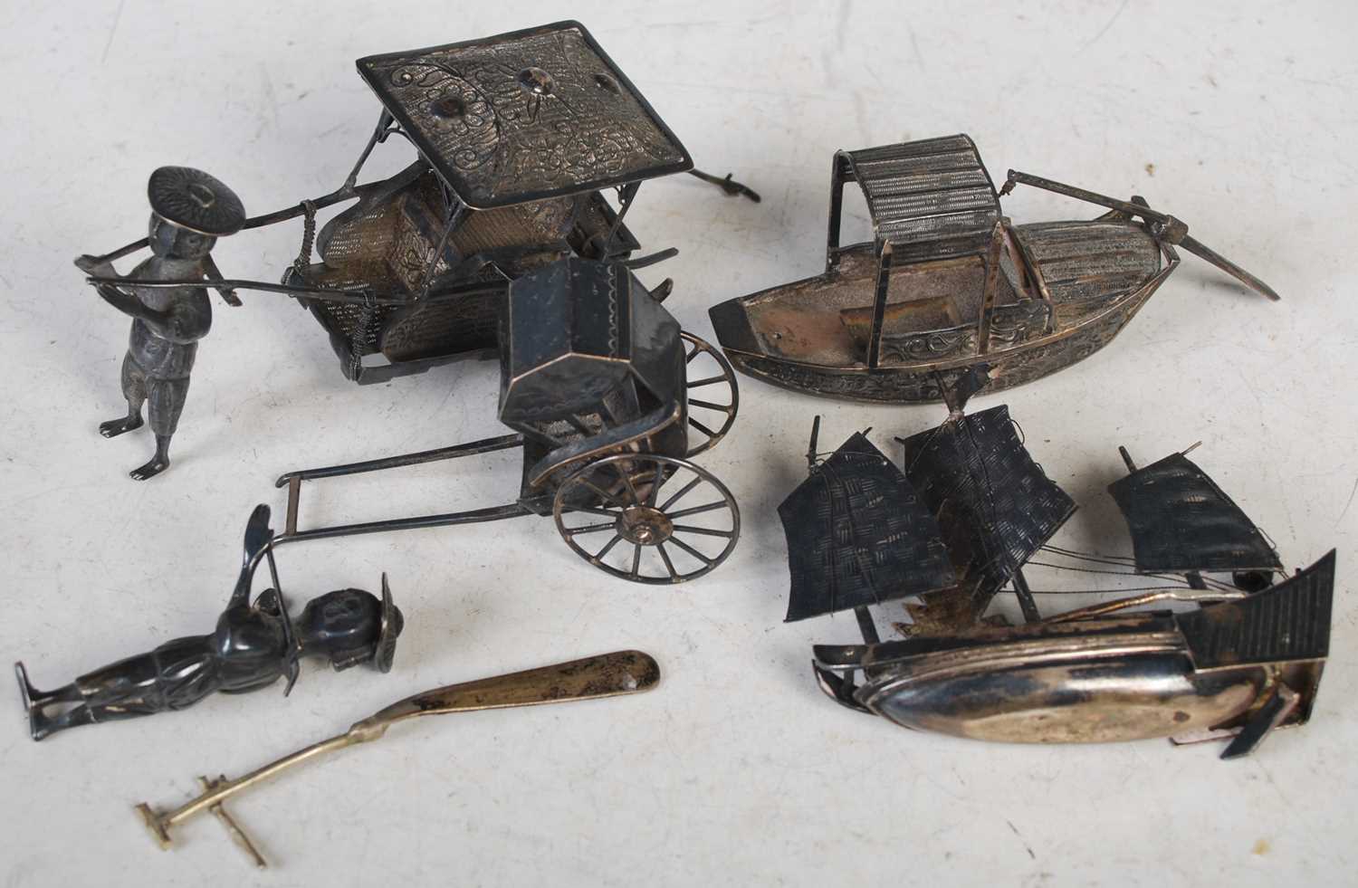 Lot 165 - A small collection of Chinese silver models