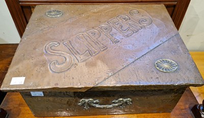 Lot 561 - An Arts & Crafts copper embossed slipper box.