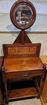 Lot 560 - A late 19th century mahogany washstand, the...