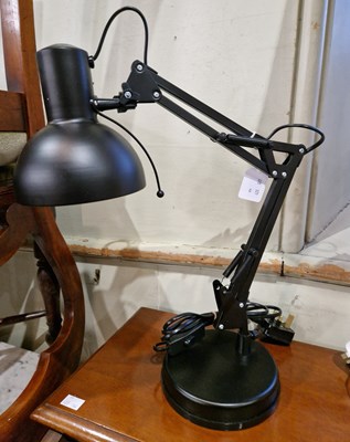 Lot 568 - A modern black angle poise lamp.