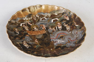 Lot 175 - A Japanese Satsuma pottery dish, late 19th/...