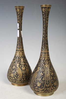 Lot 189 - A pair of Eastern brass bottle vases,...