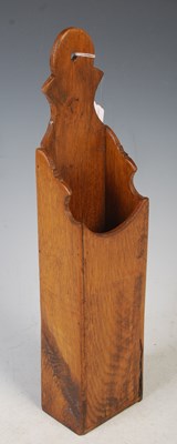 Lot 192 - A George III style oak wall mounted candle box,...