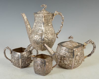 Lot 1 - A late 19th century Chinese silver four piece...