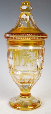 Lot 209 - A Bohemian amber flashed clear glass goblet...