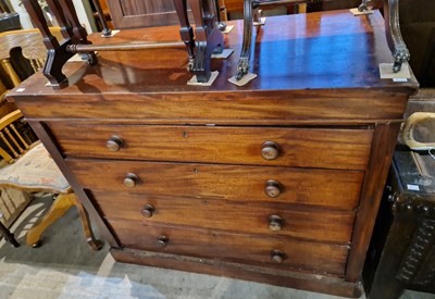 Lot 597 - A late 19th century mahogany chest of four...