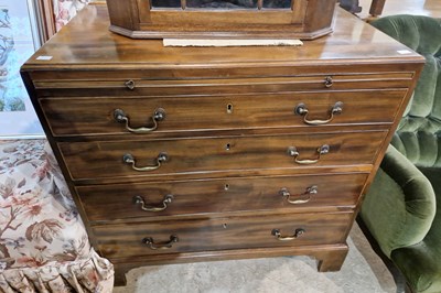 Lot 612 - A George III century mahogany bachelor's chest...