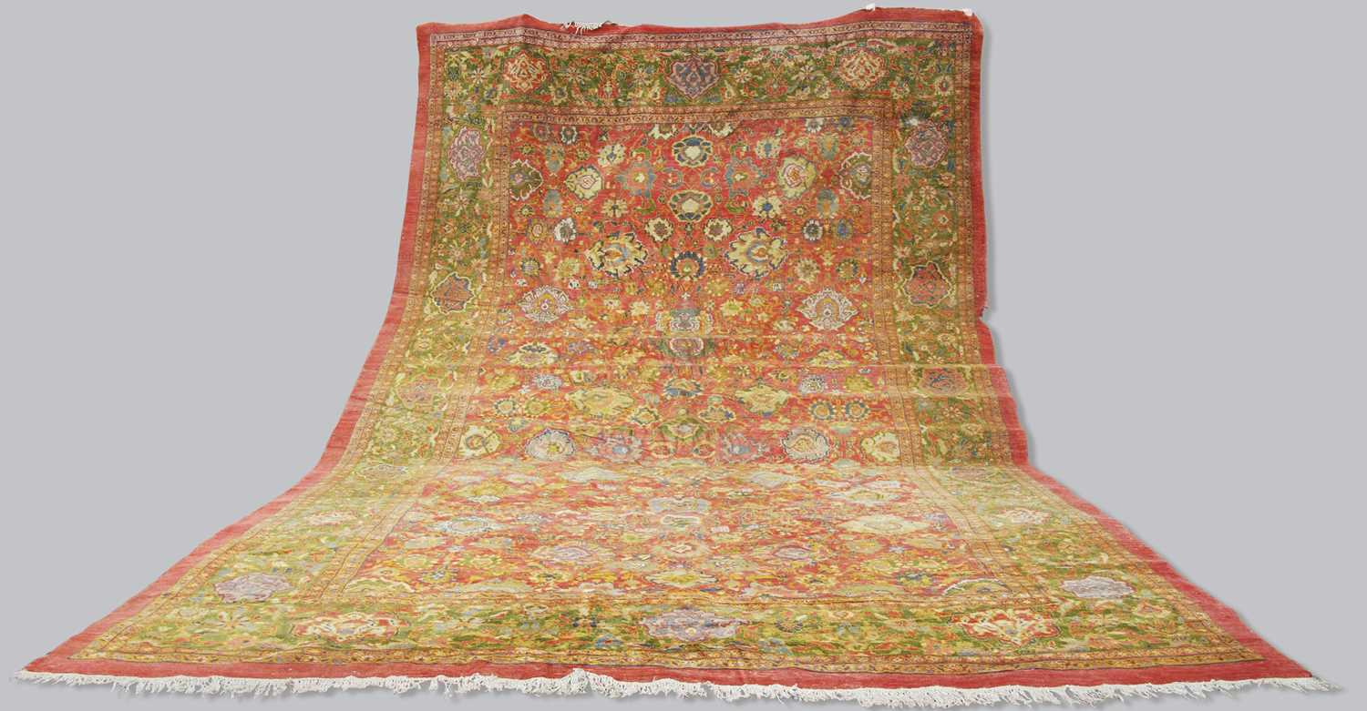 Lot 10 - A large Ushak carpet, late 19th century, the...
