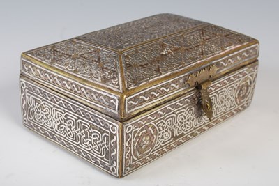 Lot 193B - A Mamluk Revival Islamic silver inlaid brass...