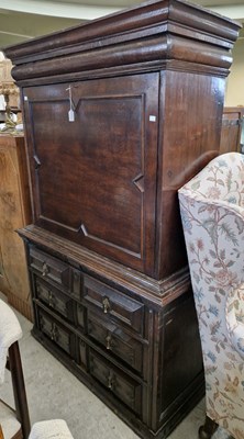 Lot 650 - An antique oak secretaire abbatant, the...