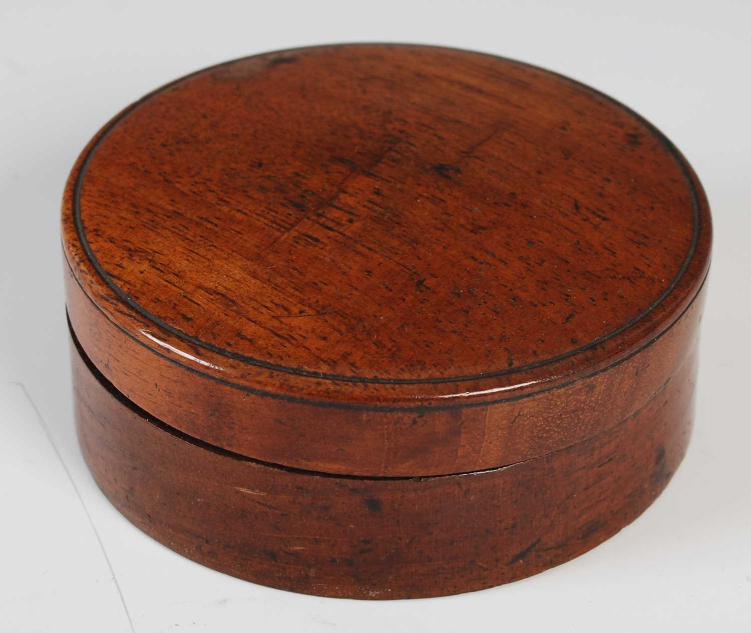 Lot 193 - A late 18th century mahogany circular box with...