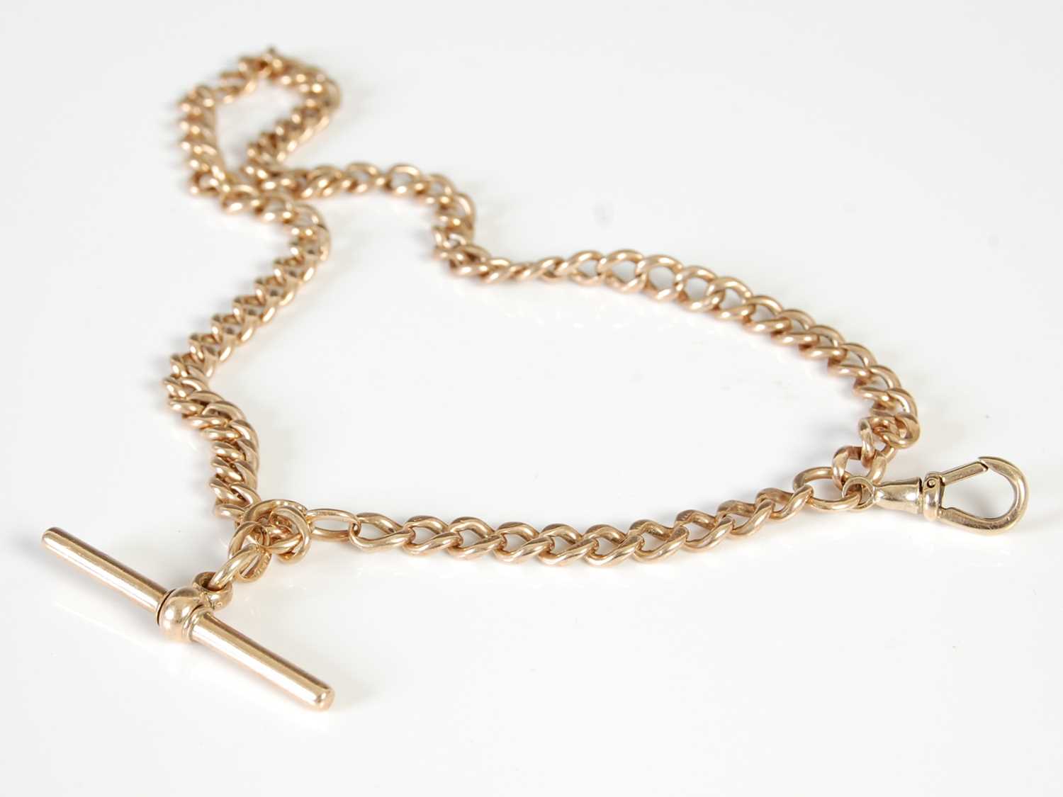 Lot 450 - A 9ct gold Albert chain with T-bar suspension,...