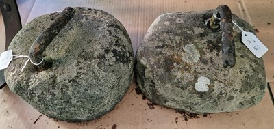 Lot 666 - Two antique curling stones.