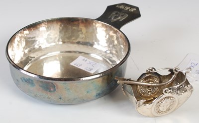 Lot 116C - An American hammered plated porringer with...