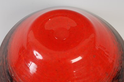 Lot 11 - A Monart glass bowl, mottled red and black...