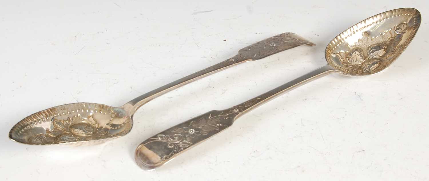 Lot 385 - A pair of George III silver strawberry spoons,...