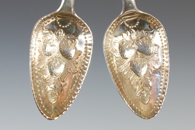 Lot 385 - A pair of George III silver strawberry spoons,...