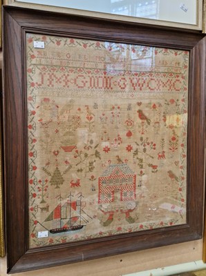 Lot 503 - A large 19th century needlework sampler,...