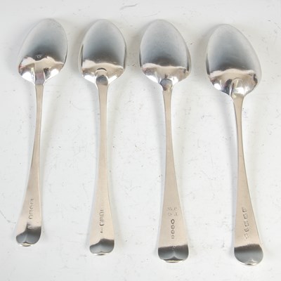Lot 385 - Four Georgian silver table spoons, to include;...