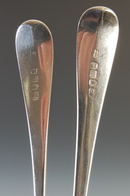 Lot 385 - Four Georgian silver table spoons, to include;...
