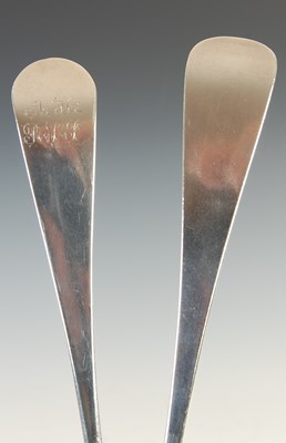 Lot 385 - Four Georgian silver table spoons, to include;...