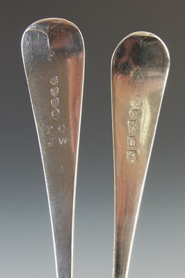 Lot 385 - Four Georgian silver table spoons, to include;...
