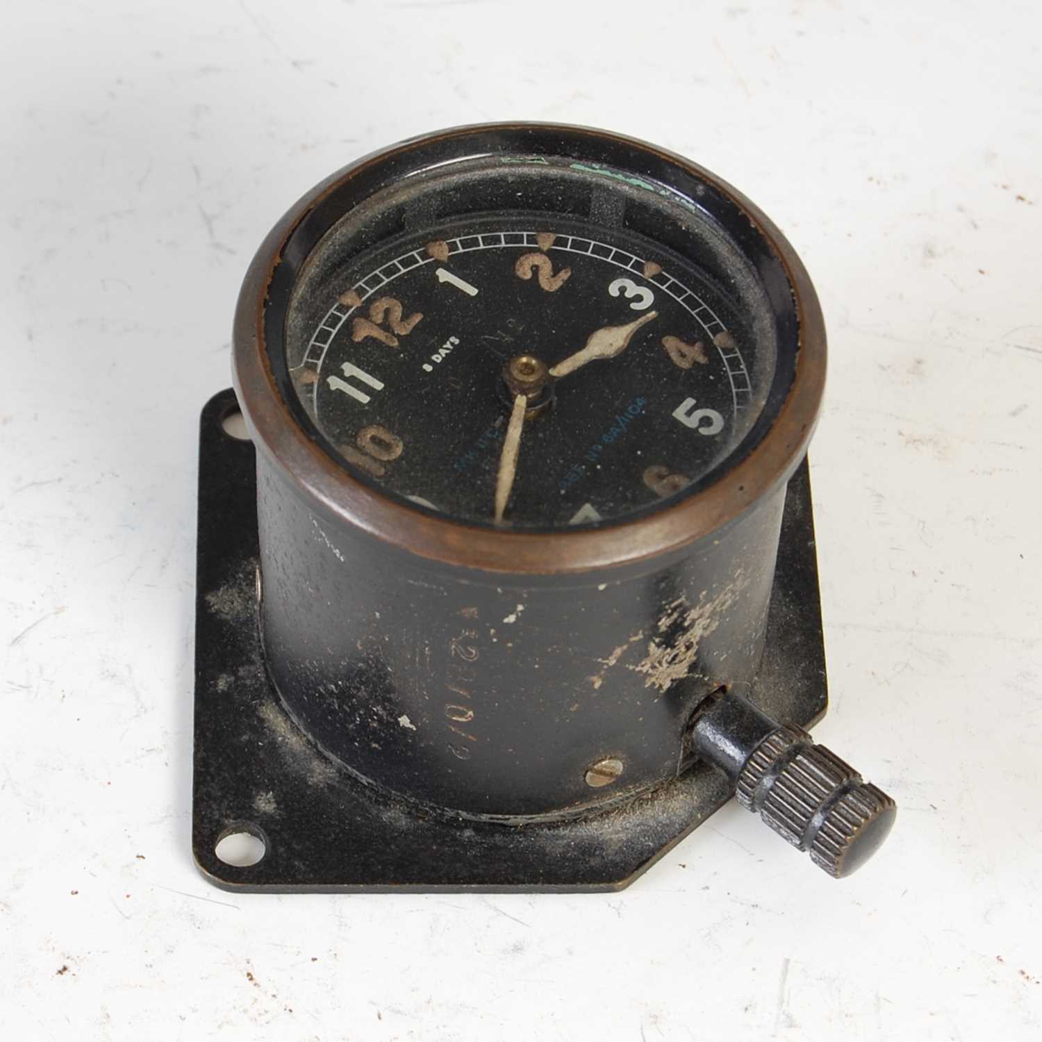 Lot 144 - A WWII aircraft cockpit clock, possibly from a...