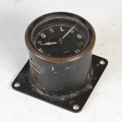 Lot 144 - A WWII aircraft cockpit clock, possibly from a...