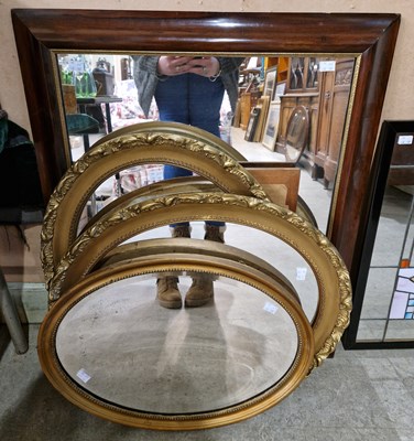 Lot 546 - A rosewood framed rectangular wall mirror...