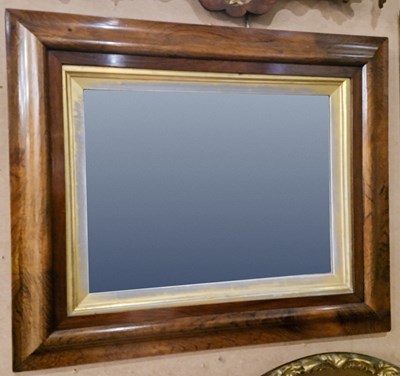 Lot 546 - A rosewood framed rectangular wall mirror...