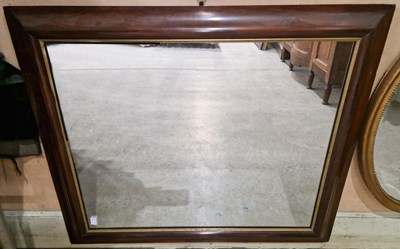 Lot 546 - A rosewood framed rectangular wall mirror...