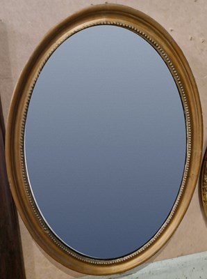Lot 546 - A rosewood framed rectangular wall mirror...