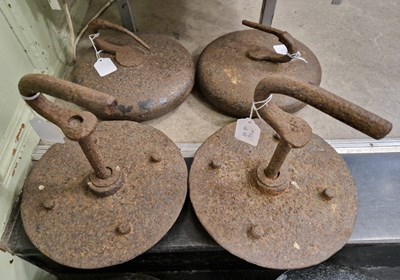 Lot 472 - A pair of antique metal curling stones and a...