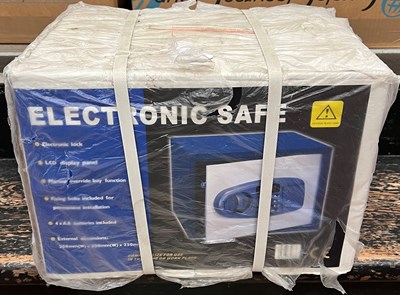 Lot 765 - A modern electronic safe, new in box.