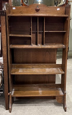 Lot 799 - An Arts & Crafts oak open bookcase, 115cm high.