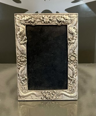 Lot 436 - A modern Chinese white metal photograph frame...