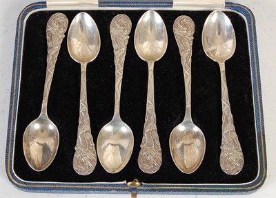 Lot 381 - A cased set of six sterling silver teaspoons...